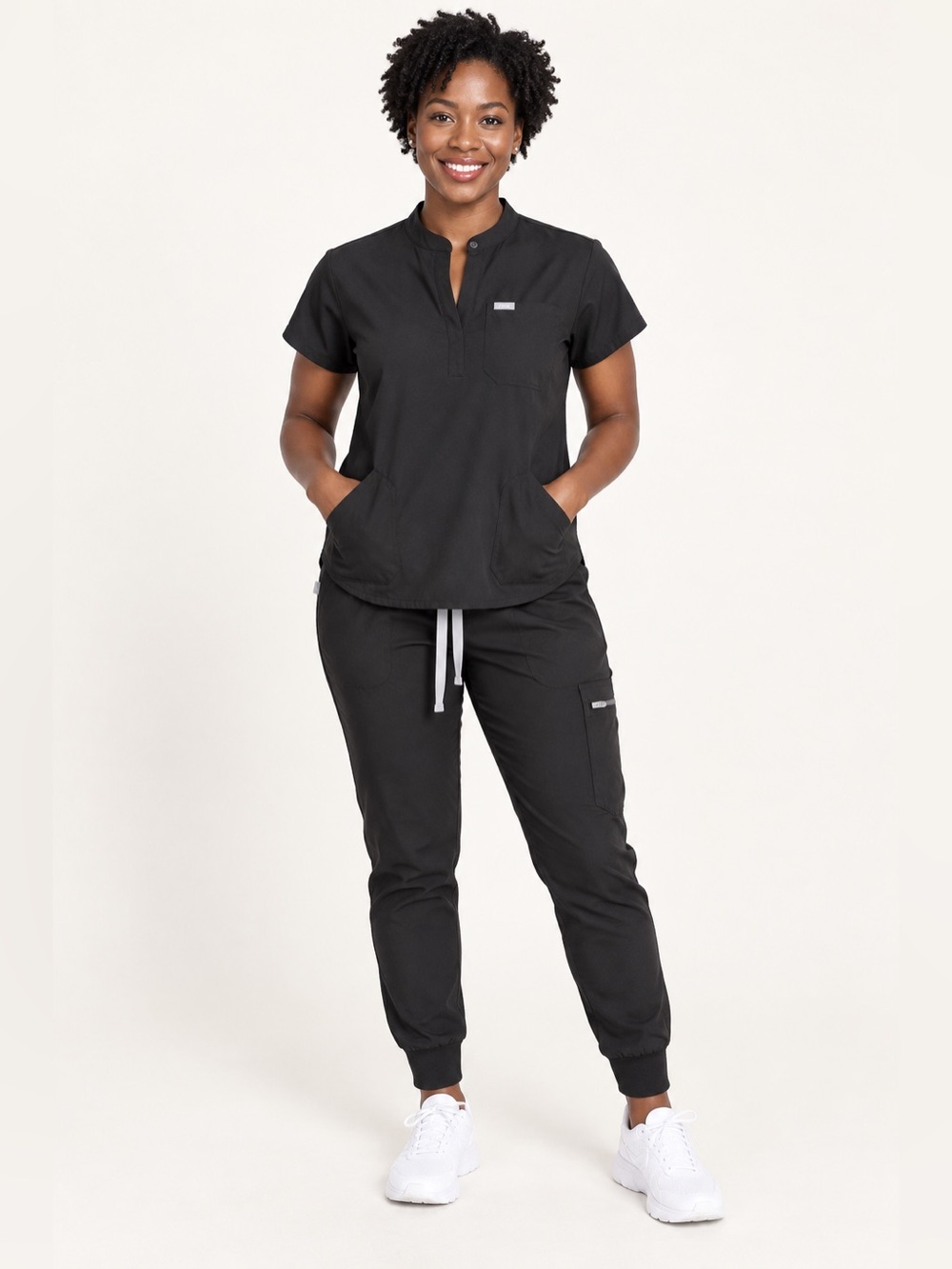 Classic black FIGS scrub set featuring a modern mandarin-collar top and joggers.